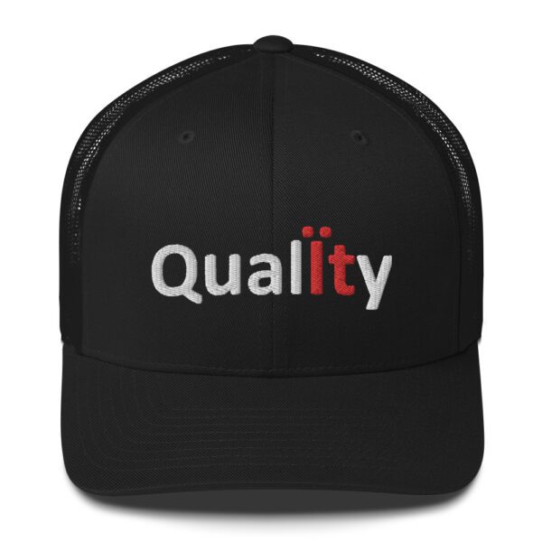 Black trucker hat with "Quality" embroidered on it.