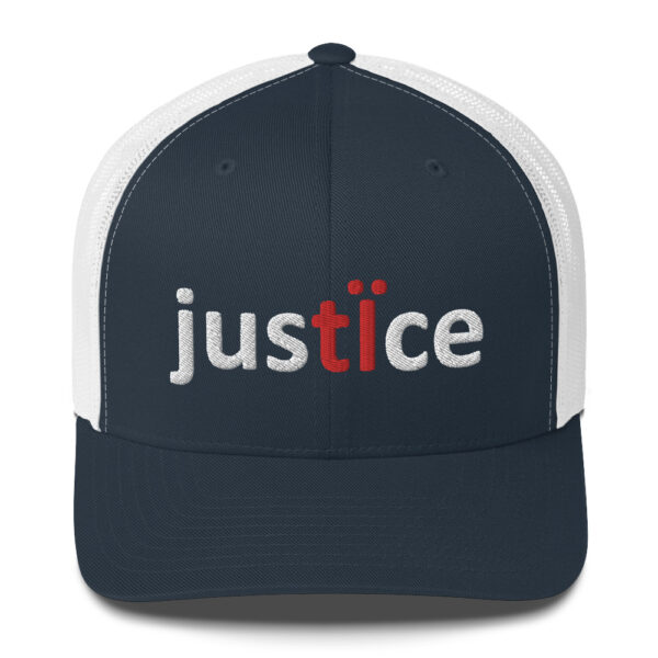 Blue and white trucker hat with "justice" embroidered on it.
