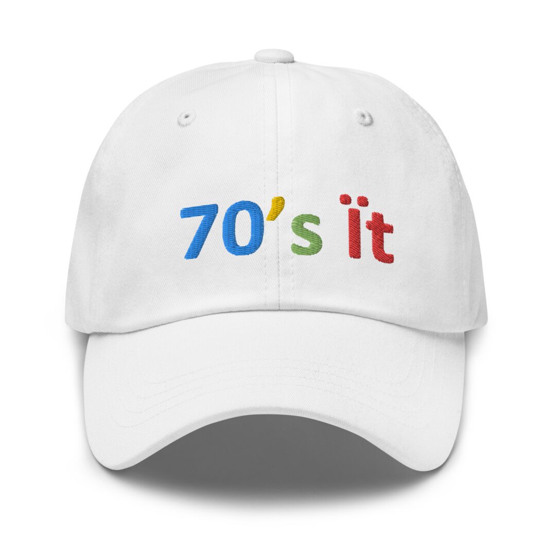 White cap with "70's it" embroidery.