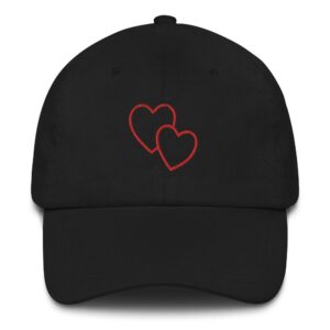 Black cap with embroidered red hearts.