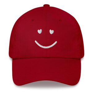 Red cap with heart eyes smiley face.