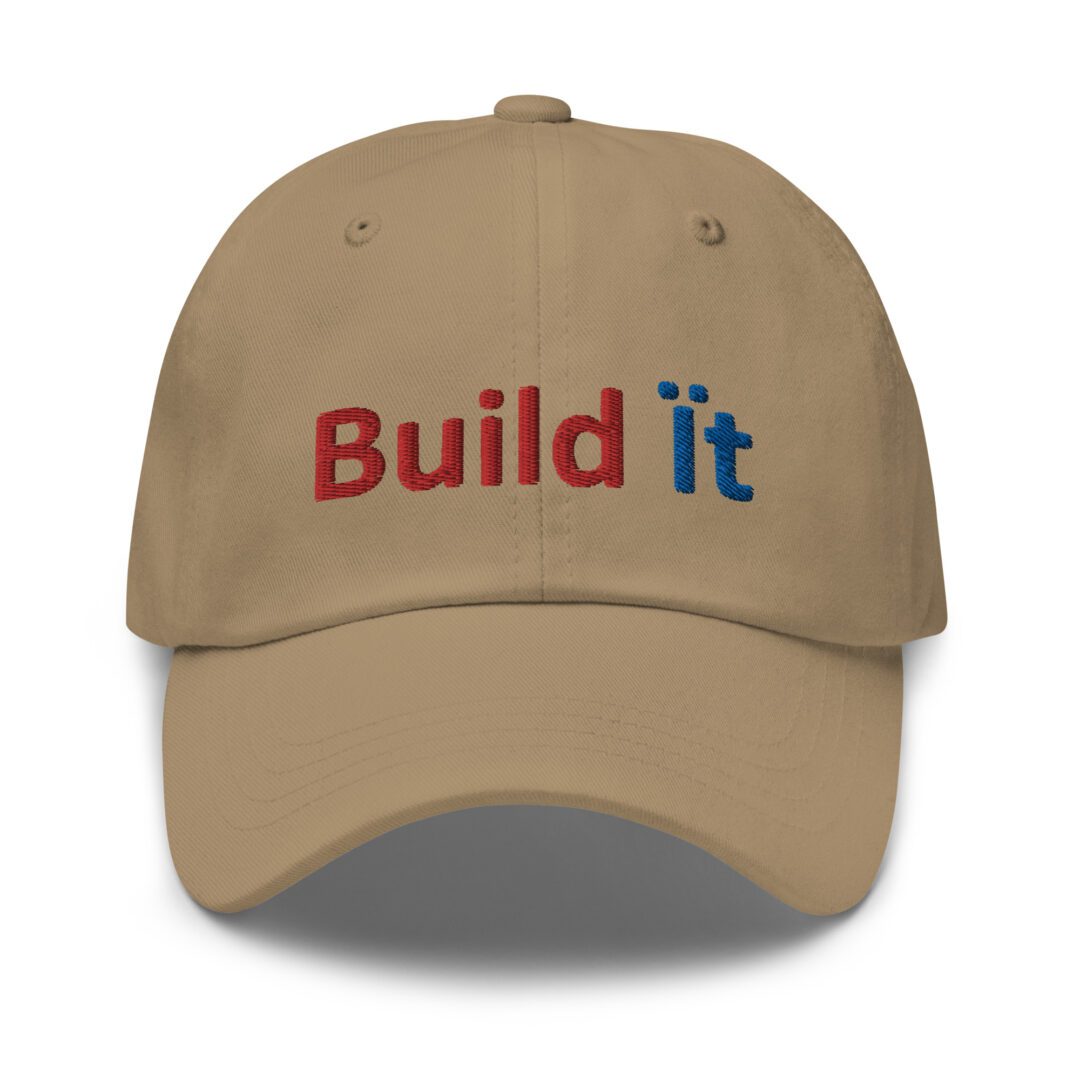 Beige cap with "Build it" text.