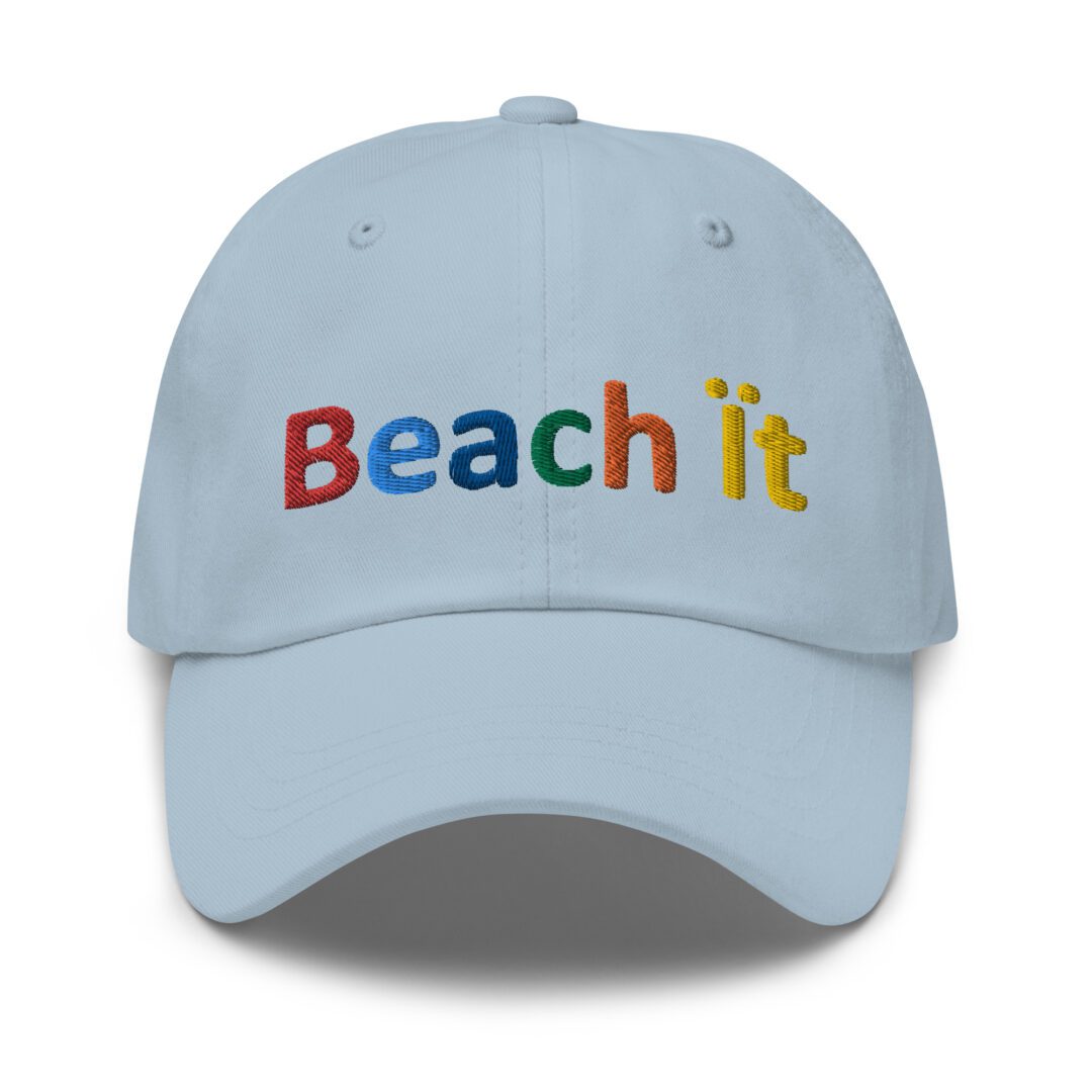 Light blue cap with "Beach it" text.