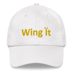 White cap with "Wing it" embroidered text.