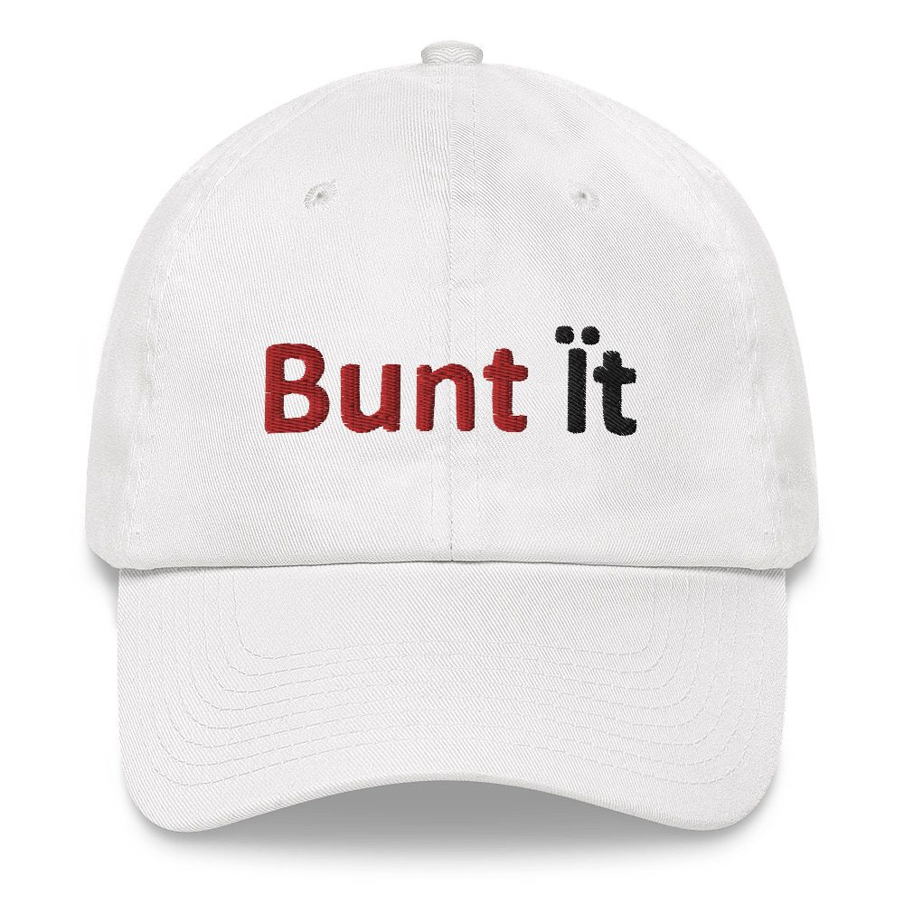 White cap with "Bunt it" embroidered text.