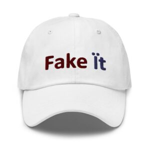White cap with "Fake It" text.