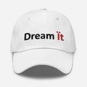 White cap with "Dream it" embroidered text.