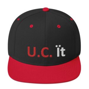Black and red cap with "U.C. it".